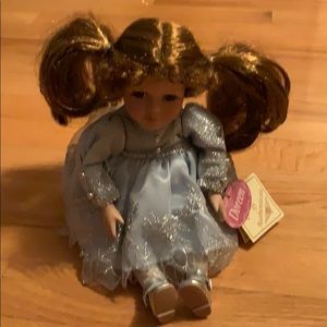 Musical porcelain doll